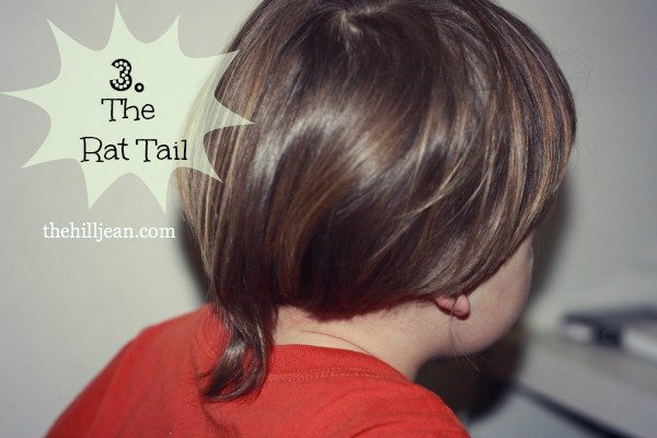 little boy with rat tail